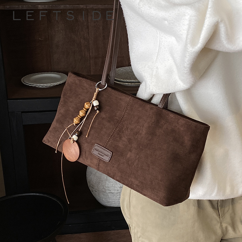 حقيبة كتف من الجلد المدبوغ بتص - مراجعة Women Bags 2026 Trends وسعره